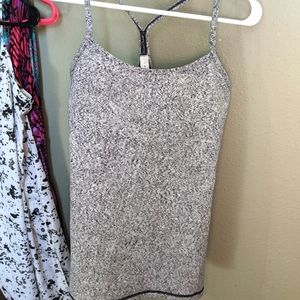 Black and White form fitting Lululemon athletic tank